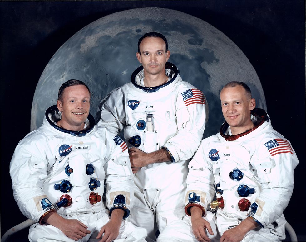 Neil Armstrong, Michael Collins and Edwin Aldrin Jr. in spacesuits at Manned Spacecraft Center