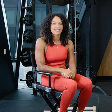 a man and woman sitting on treadmills