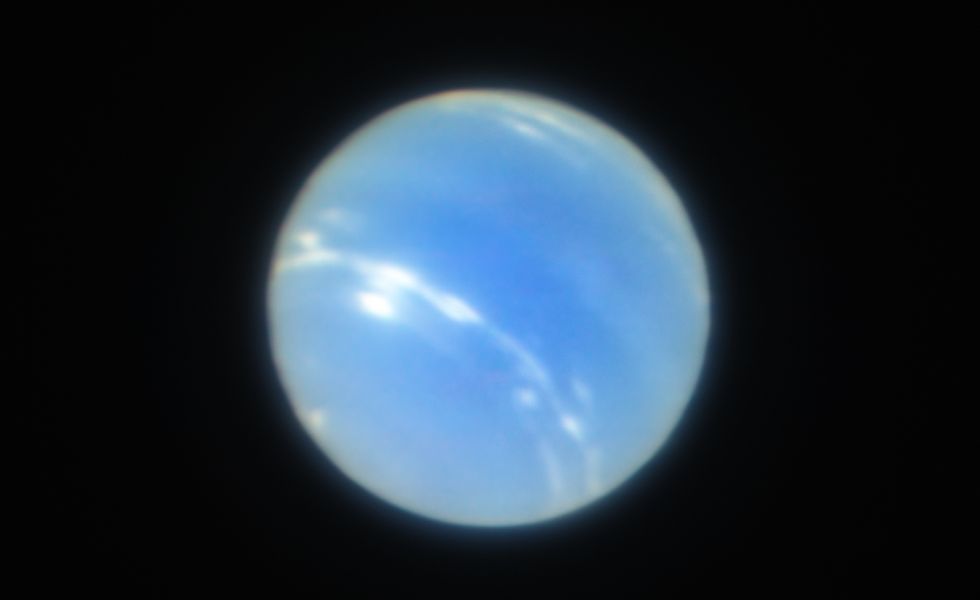this image of the planet neptune was obtained during the testing of the narrow field adaptive optics mode of the musegalacsi instrument on eso’s very large telescope the corrected image is sharper than a comparable image from the nasaesa hubble space telescope
