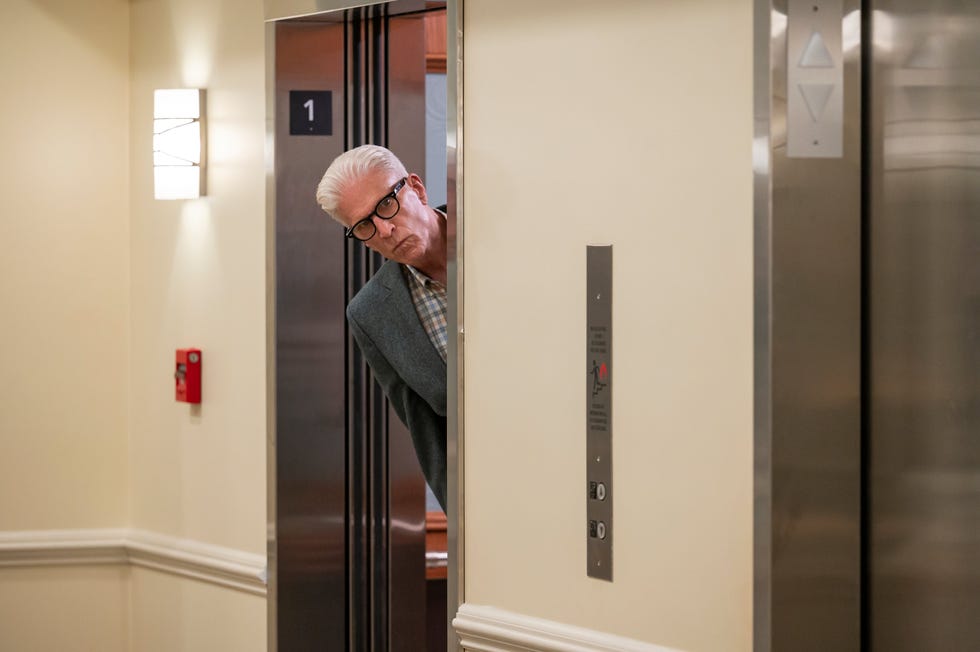 Ted Danson as Charles looking down a corridor from an elevator in a scene from the Netflix sitcom “A Man on the Inside”