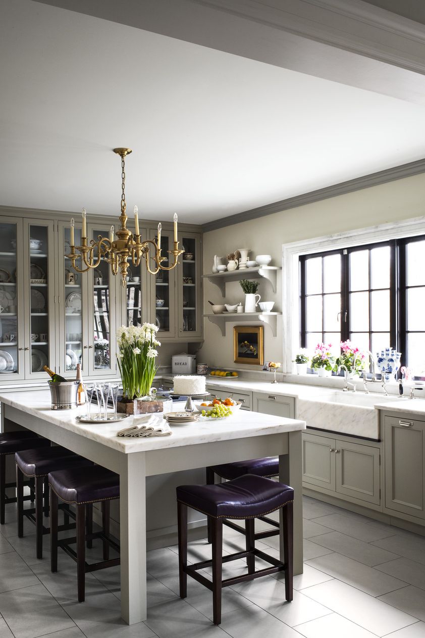 10 ways interior designers work color into neutral kitchens
