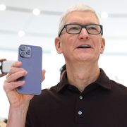 tim cooks holds apple iphone 14 pro iphone at cupertino california event