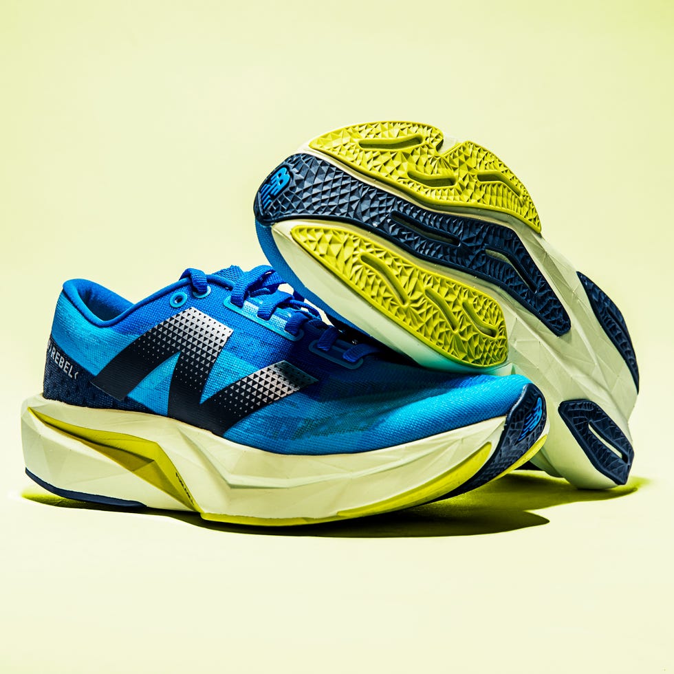 a pair of blue and yellow running shoes