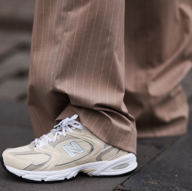 a person's legs and shoes new balances