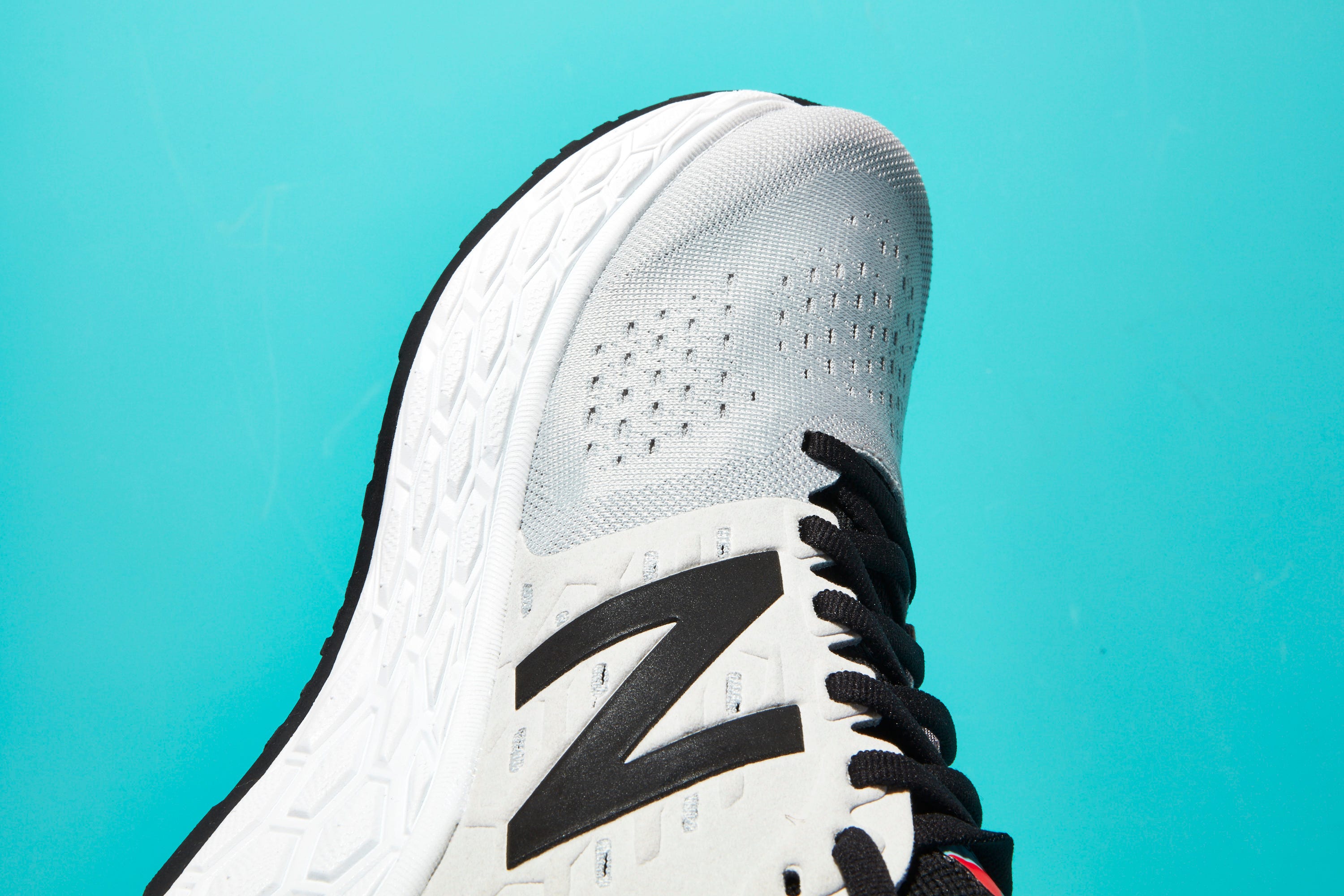 White, Footwear, Shoe, Outdoor shoe, Font, Walking shoe, Athletic shoe, Sneakers, Carmine, Sportswear, 