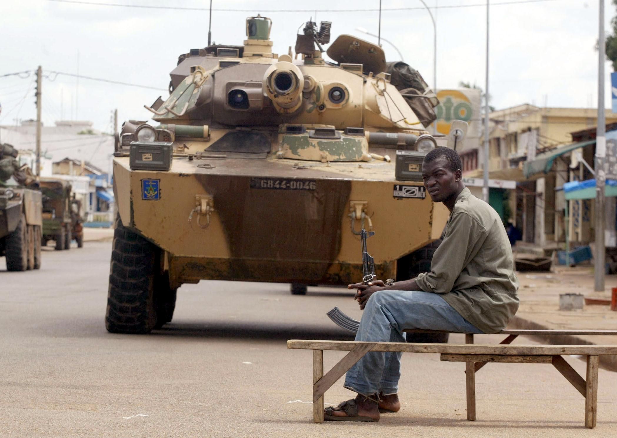 new-forces-fighter-seats-in-front-of-a-french-armored-car-news-photo-1672948940.jpg