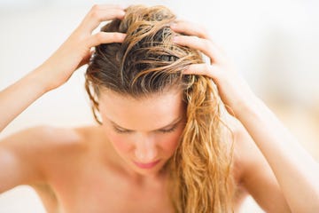 usa, new jersey, jersey city, woman washing hair