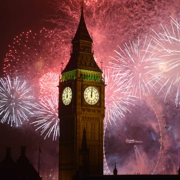 spectacular fireworks surround big ben at midnight on new years eve