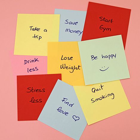 new year's resolutions on sticky notes for new year traditions