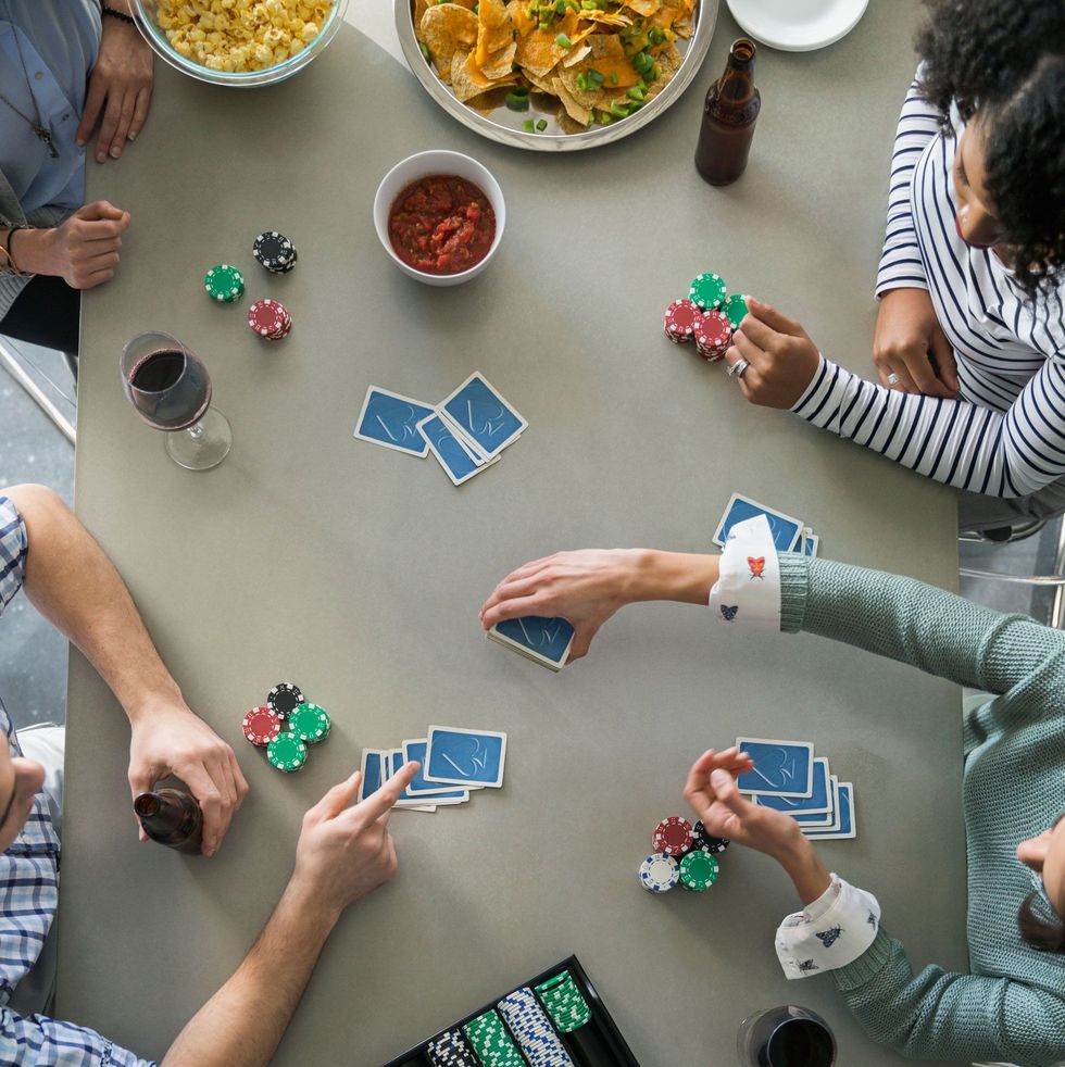 group of people playing poker