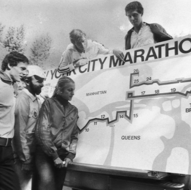 new york city marathon runners and fred lebow looking over t