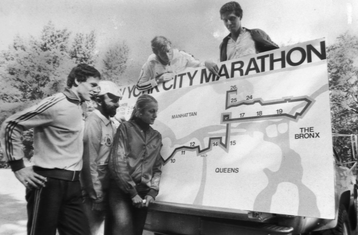 new york city marathon runners and fred lebow looking over t