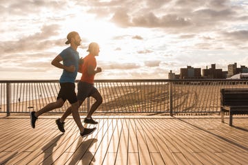 usa, new york city, two men running on coney island