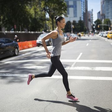 usa, new york city, woman running on urban street