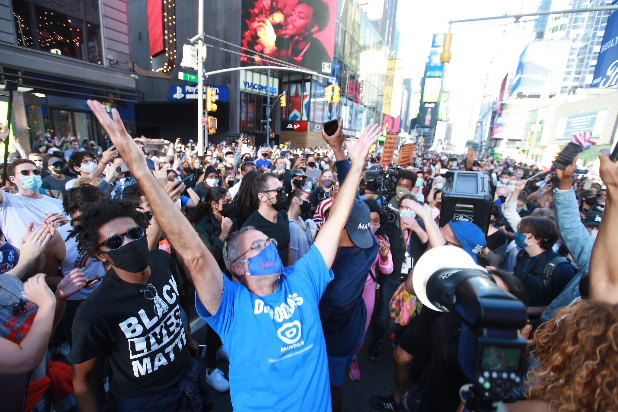 thousand show up for a part in the streets at times square to celebrate president elect joe biden and vice president kamala harris in times square