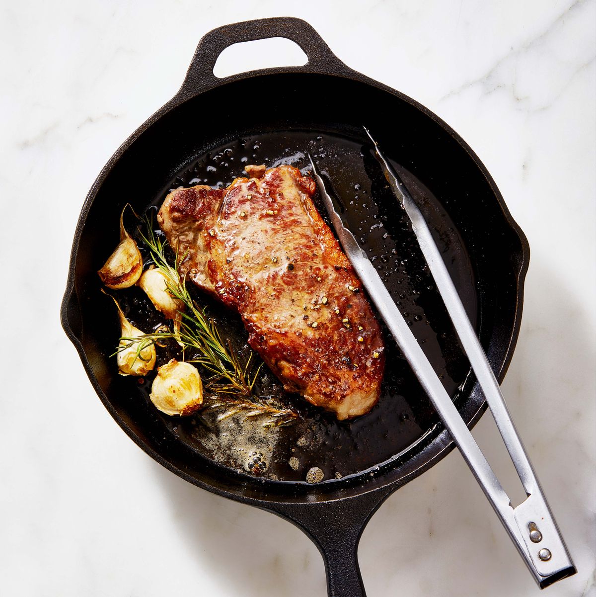 new york strip steak on a cast iron skillet