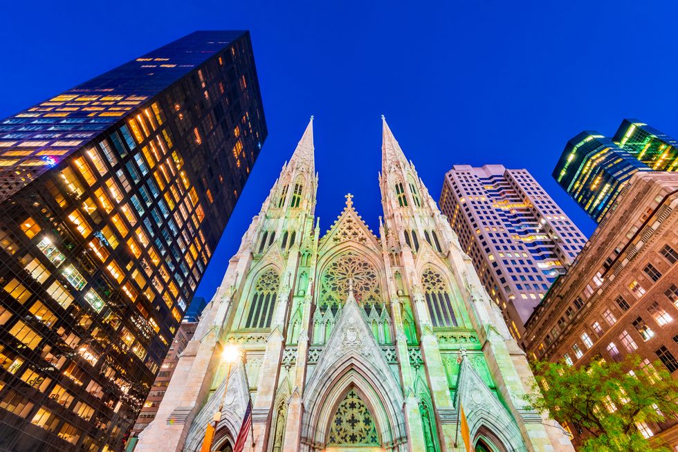 saint patrick's cathedral in new york city is lit up green