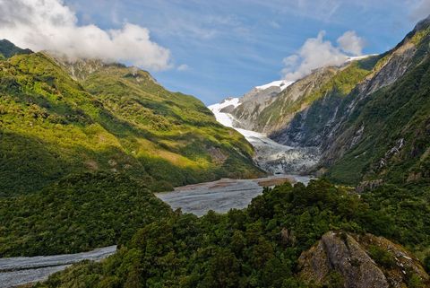Follow the twomile trail through a rain forest of ferns orchids and rimus tangled in vines The trees will open up to a lookout over the Tasman Sea and Waiho River flowing with little icebergs Continue upward to the second viewpoint and go facetoface with Franz Josef