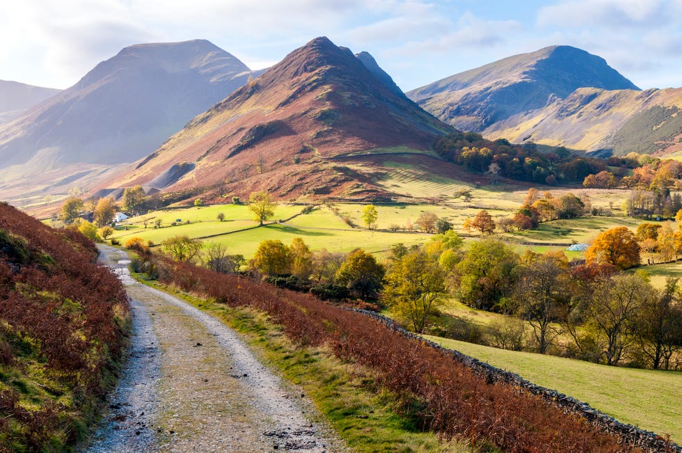 newlands valley with surrounding mountains on a beautifully lit autumn daylake district, cumbria uk, europe