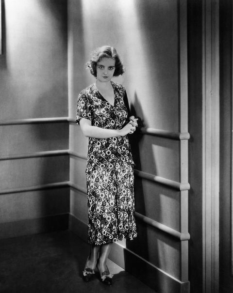 Actress Bette Davis Posing in Patterned Dress in Bad Sister