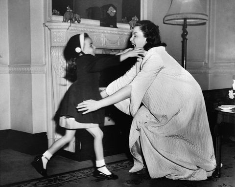 Judy Garland Reaching out for Her Young Daughter Liza