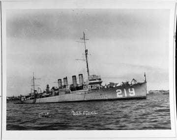 us navy ship uss edsall docked in water