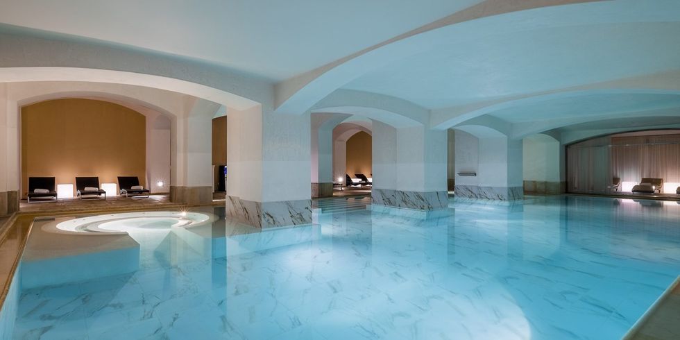 a swimming pool with a large room