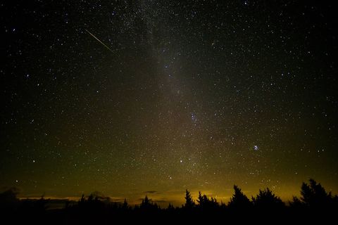 in this 30 second exposure, a meteor streaks across the sky during the annual perseid meteor shower friday, aug 12, 2016 in spruce knob, west virginia photo credit nasabill ingalls