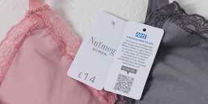 nhs x morrisons bra with label reminding the wearer to check their breasts