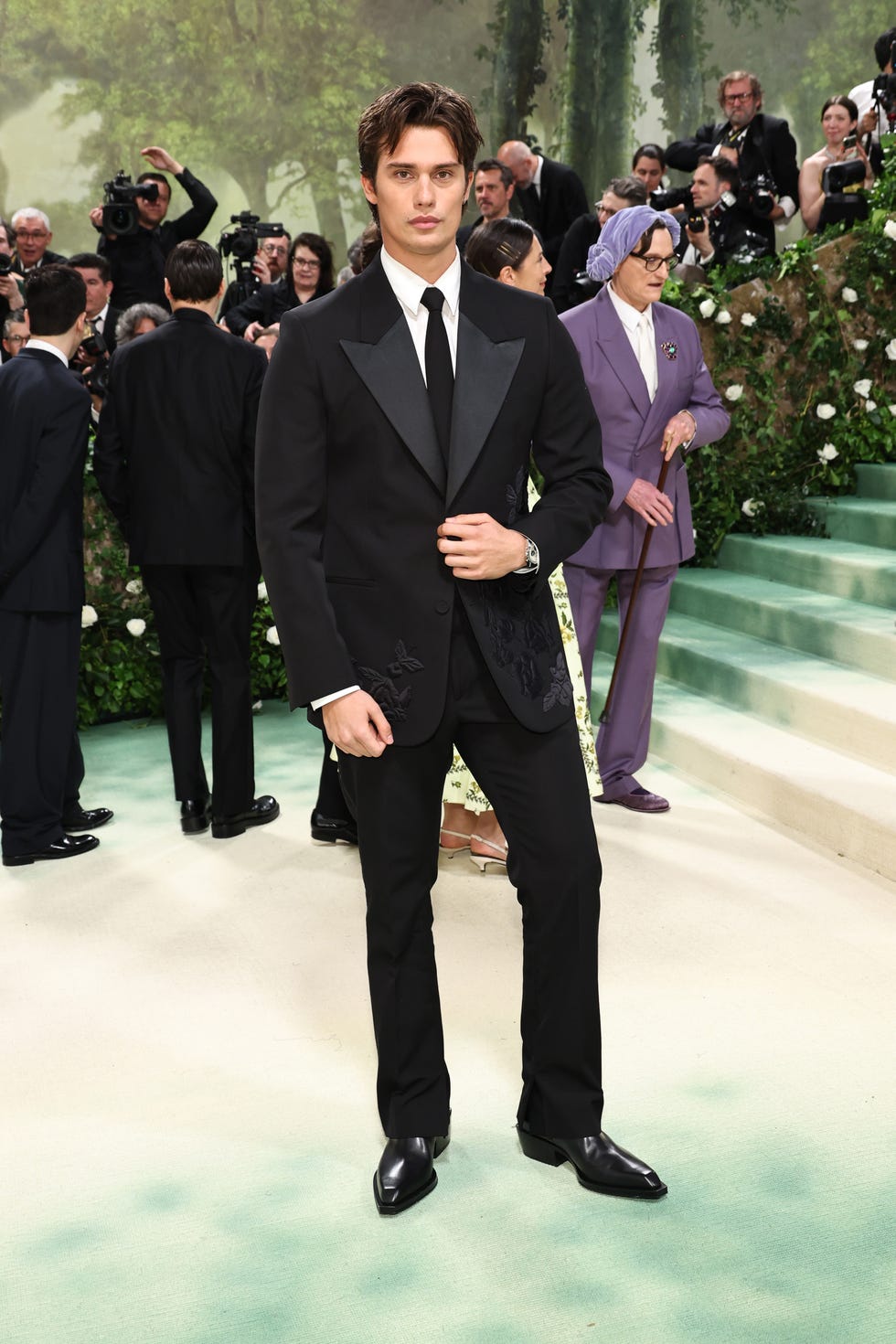 nicholas galitzine in a formal black suit at the met gala 2024