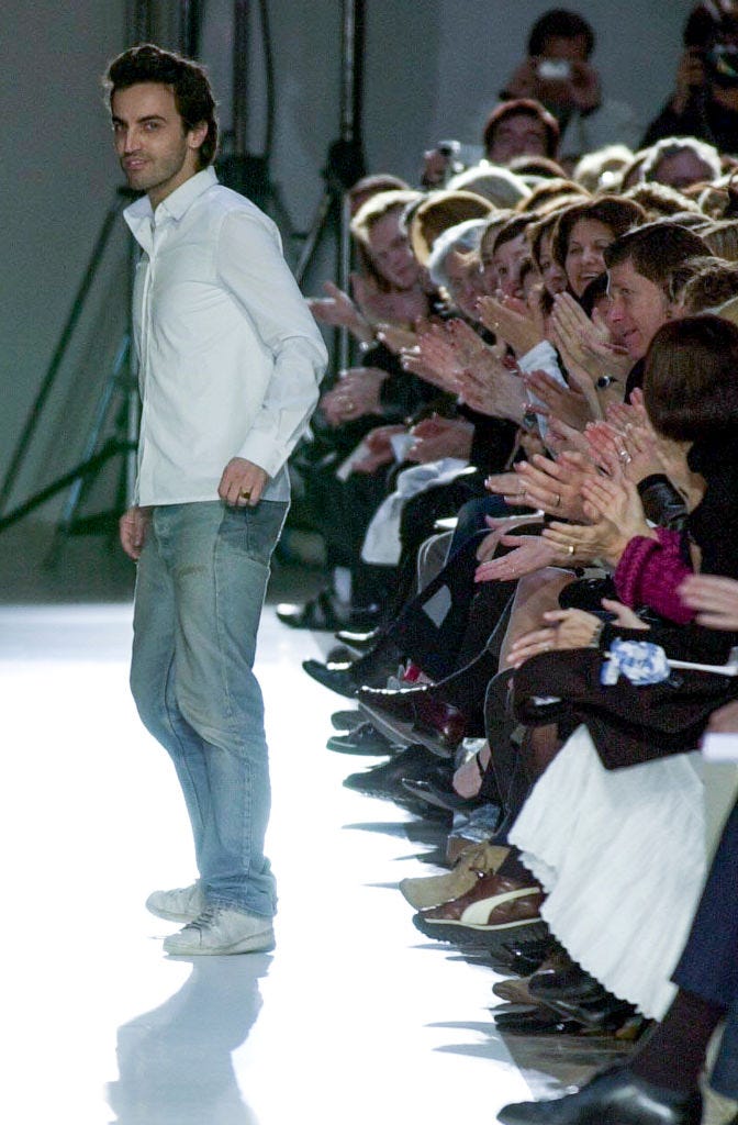 designer nicolas ghesquiere walks the runway during the balenciaga fall winter 2001 2002