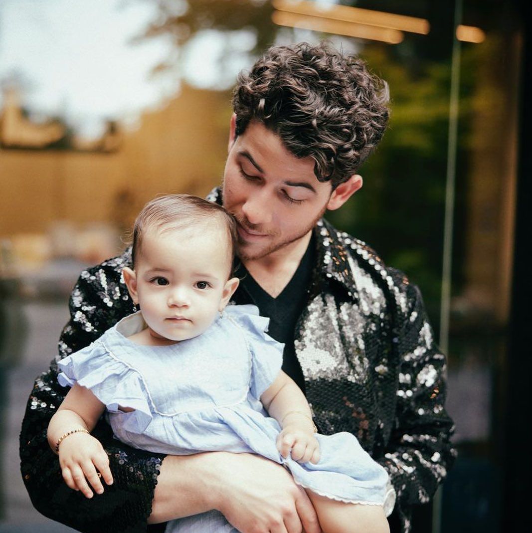 The singer posed with his 17-month-old for a darling picture. 