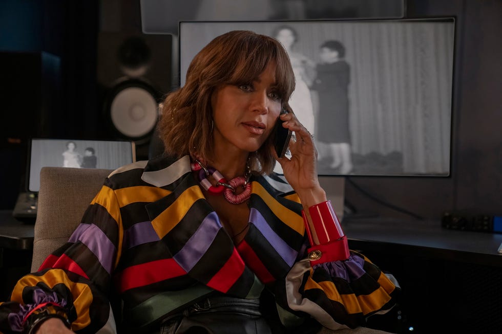 A person making a phone call in a creative workspace