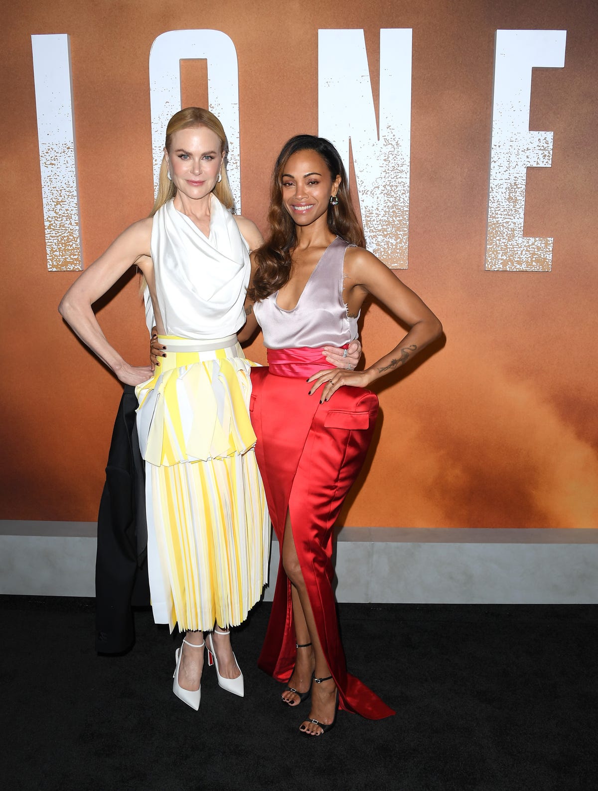 Nicole Kidman and Zoe Saldana showcase exaggerated hips on the red carpet