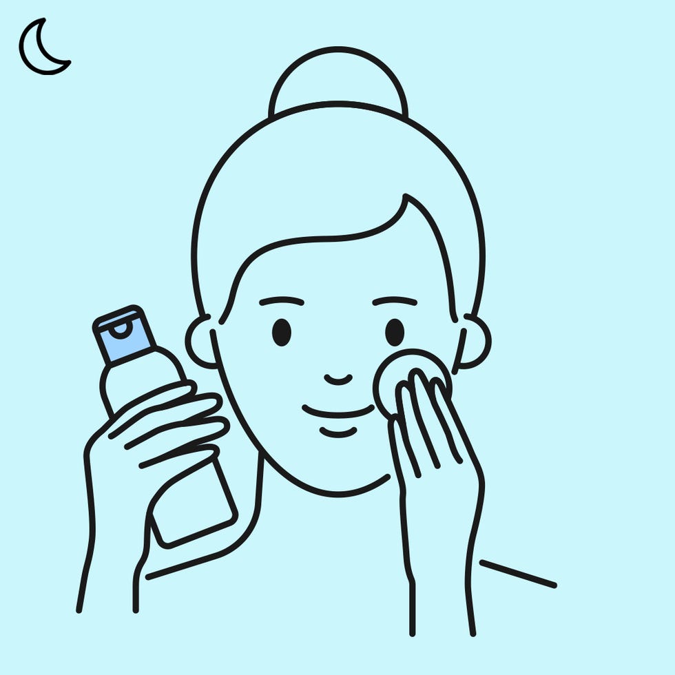 woman applying toner on face at night