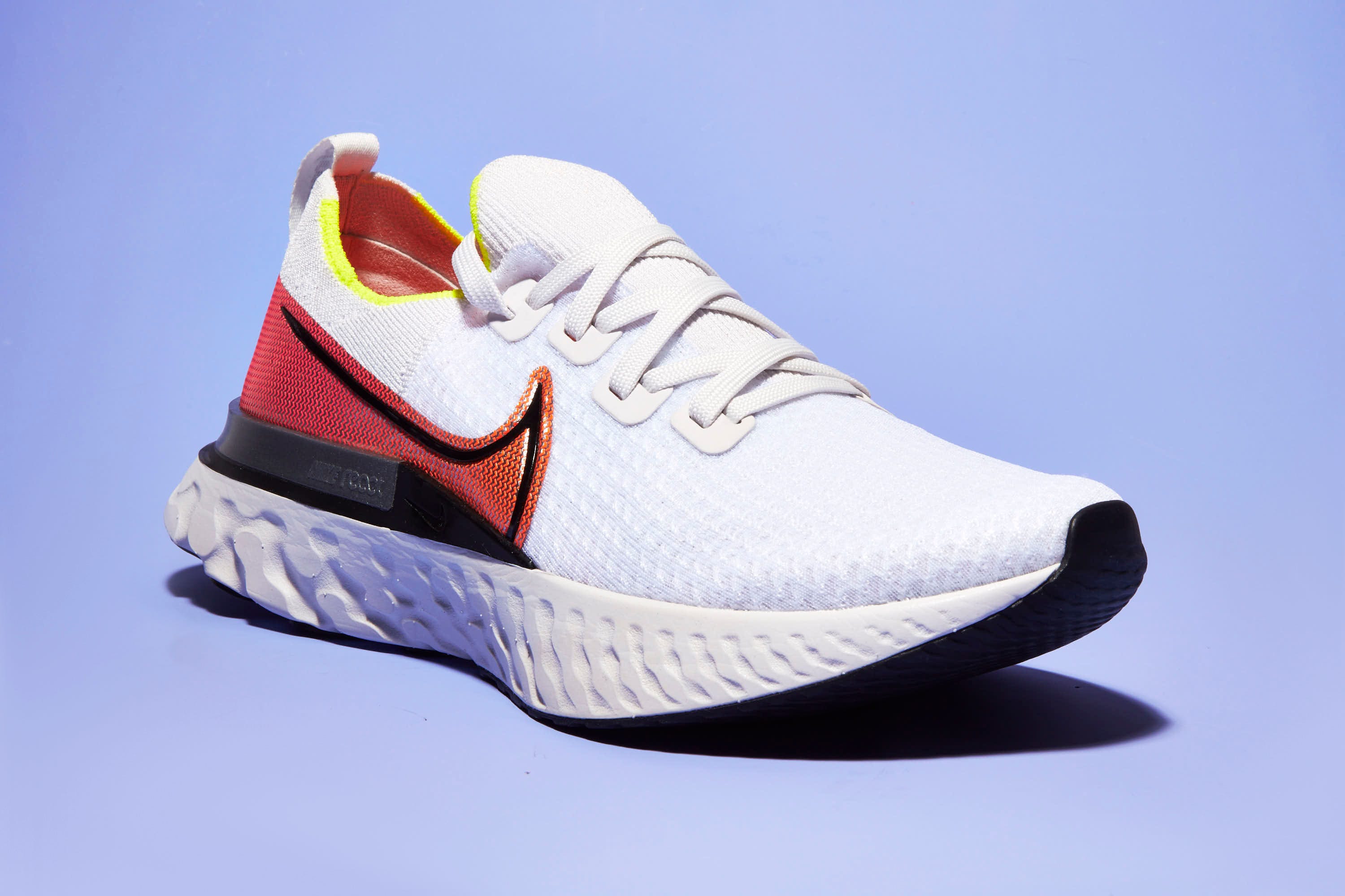 Footwear, White, Shoe, Walking shoe, Orange, Sneakers, Outdoor shoe, Running shoe, Sportswear, Athletic shoe, 