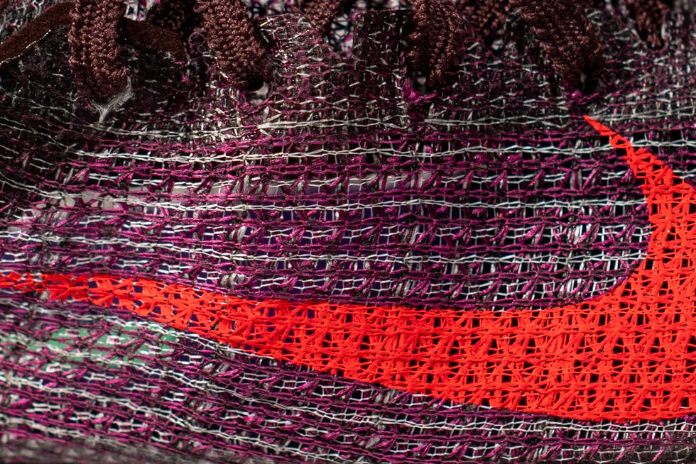 Closeup of a Nike shoe showing texture and logo detail