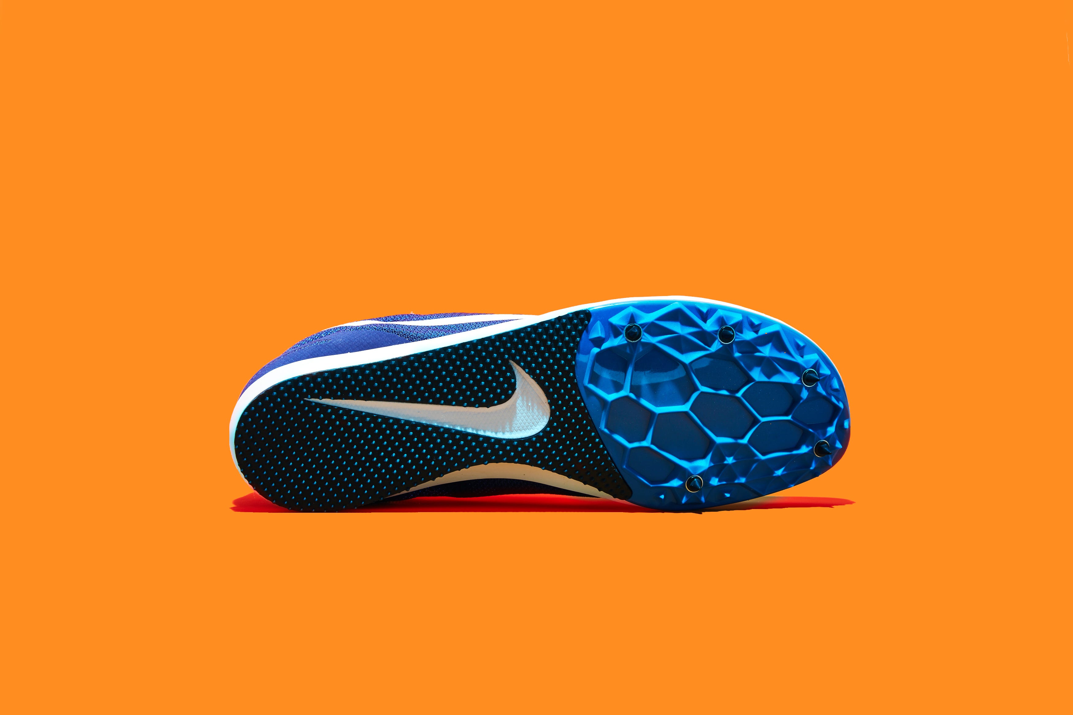 Footwear, Orange, Electric blue, Shoe, Nike free, Cobalt blue, Running shoe, Outdoor shoe, Athletic shoe, Cross training shoe, 