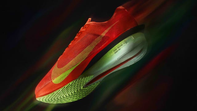 nike racing shoe with vibrant red and green design