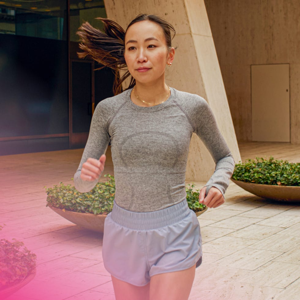 person jogging outdoors in athletic attire