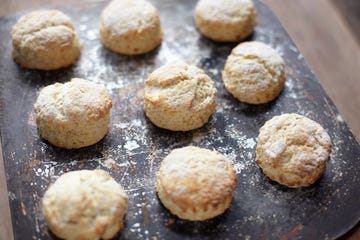 Nine freshly baked scones on baking tray
