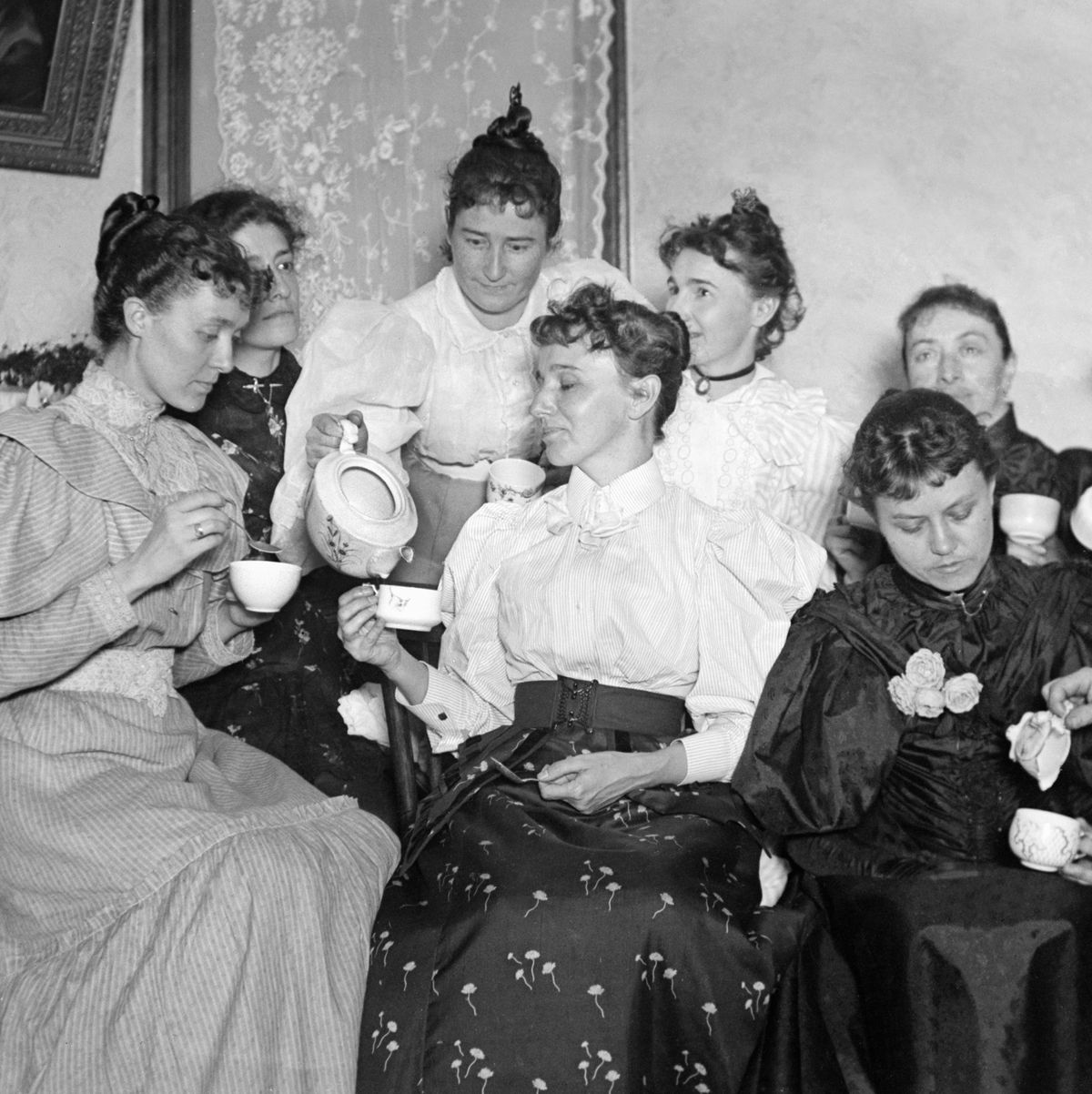 Women at a tea party, ca. 1900.