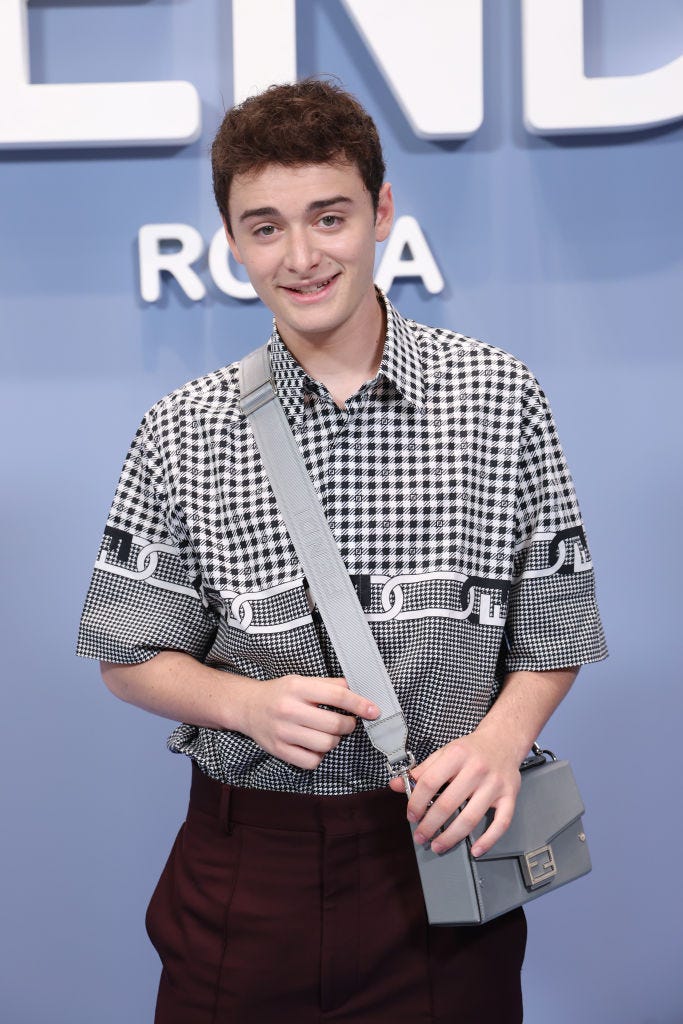 Noah Schnapp attends the Fendi fashion show during Milan Men's Fashion Week on June 18, 2022 in Milan, Italy. Photo by Daniele Venturighetti Fendi Images