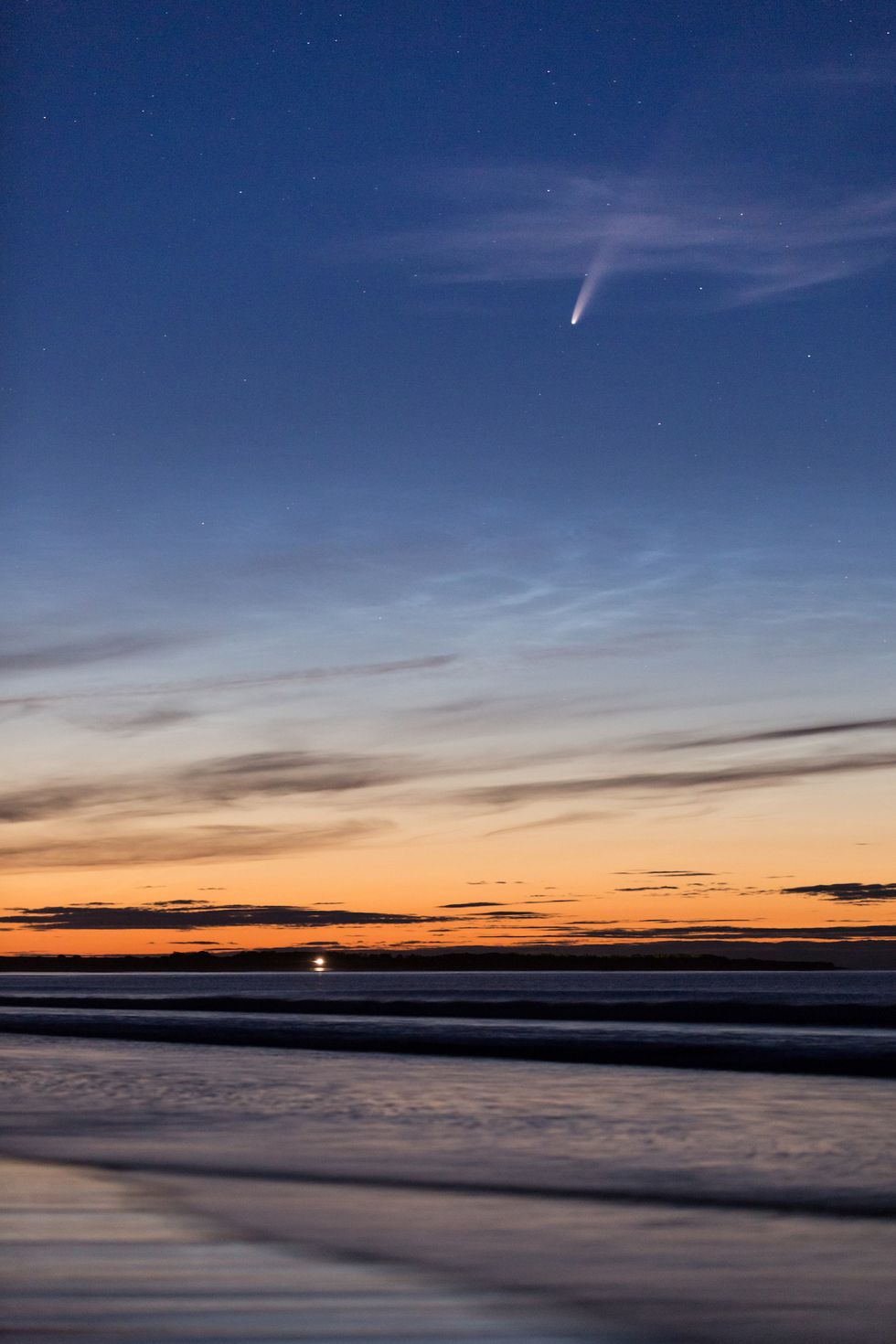 noctilucent clouds spotted on the beach at druridge bay on the northumberland coast, north east england