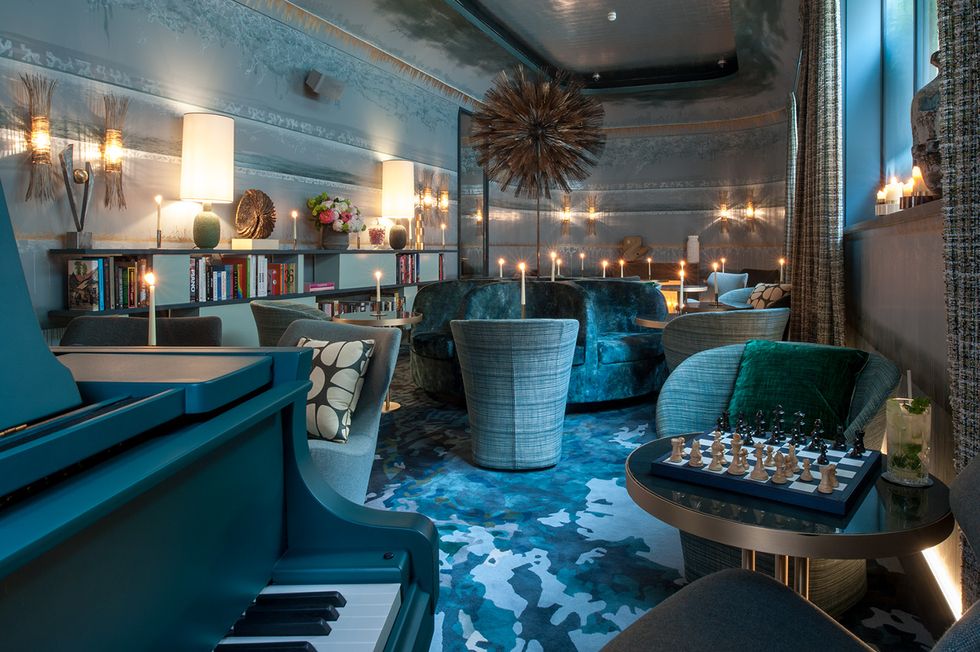 Building, Turquoise, Interior design, Room, Architecture, Lobby, Leisure, Hotel, House, Table, 