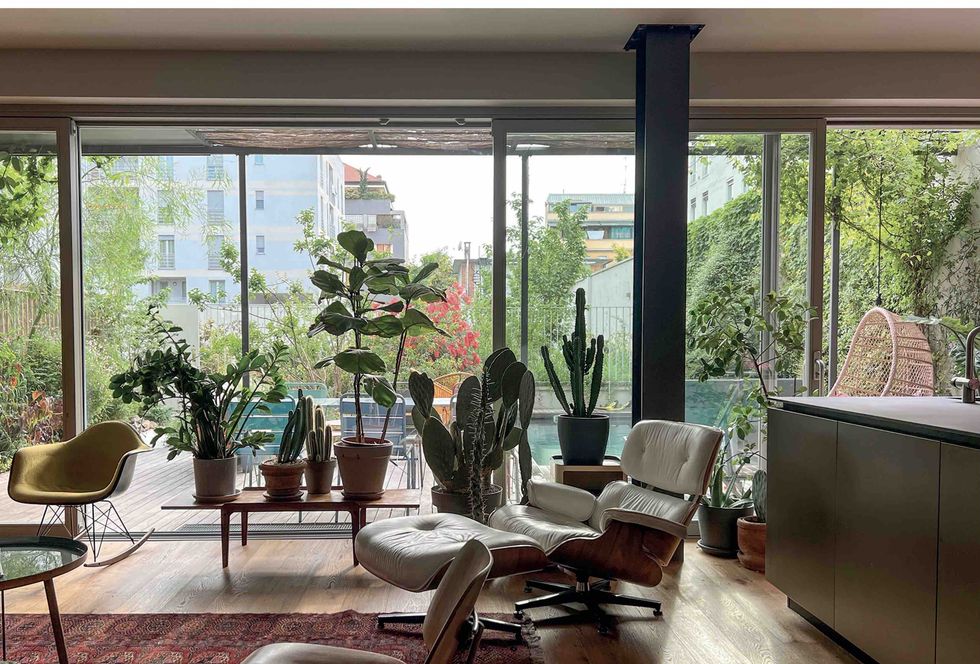a living room with large windows