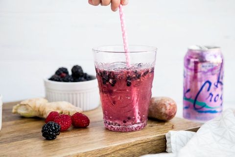 ginger berry mocktail on wood surface