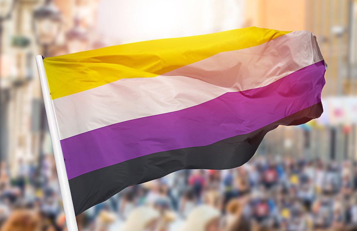 non binary pride flag blowing