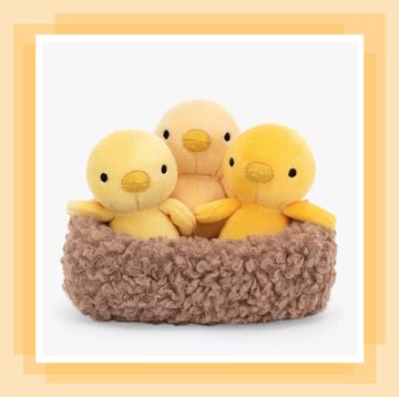 soft toy of three yellow easter chicks in basket