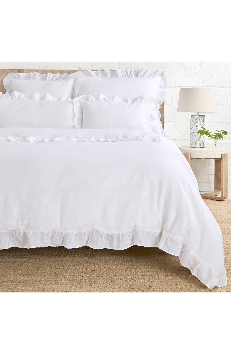 cozy white bedding set with ruffled edges